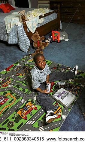 Playing, Bedroom, Child, African American, Toys, Floor View Large Photo Image Stock Photography - Playing, Bedroom, Child, African American, Toys, Floor. Fotosearch