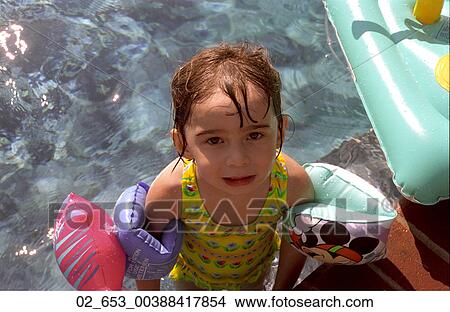 Playing, Child, Summer, Outside, Water, Pool, Float View Large Photo Image Picture - Playing, Child, Summer, Outside, Water, Pool, Float. Fotosearch