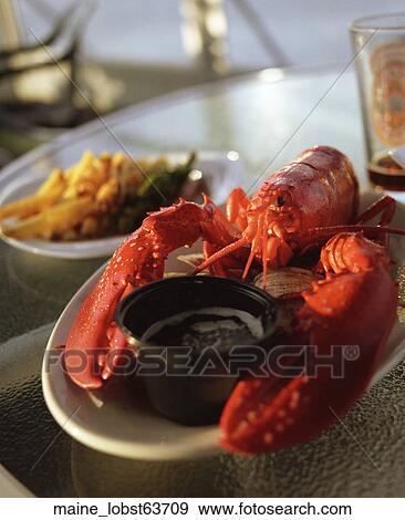 Stock Photo - Seafood, Lobster, Whole, Butter, Plate, Cooked, Dinner. Fotosearch