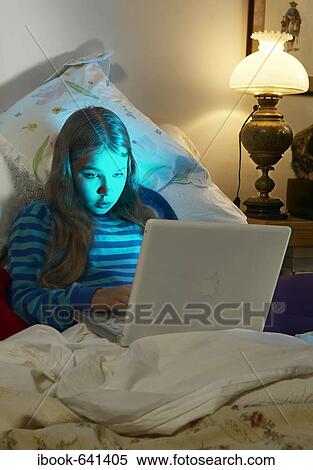Still Life, Computer, Bed, Girl, Teenager View Large Photo Image Stock Photography - Still Life, Computer, Bed, Girl, Teenager. Fotosearch