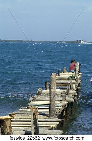 Stock Image - Still Life, Pier, Ocean, Sea, Water, Beach. Fotosearch