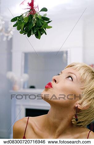 Stock Photograph - Studio / Portrait, Winter, Waiting For A Kiss, Under 35, Solo. Fotosearch