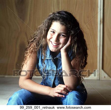 Teenager, Denim, Jeans, Vest, Smiling, Smile View Large Photo Image Stock Image - Teenager, Denim, Jeans, Vest, Smiling, Smile. Fotosearch