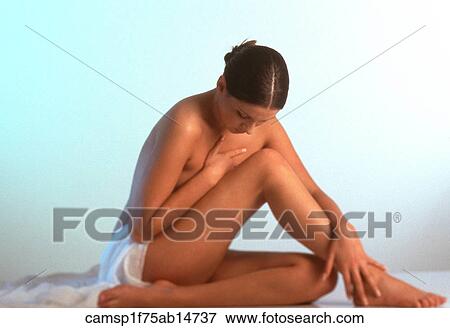 Stock Photo - Under 35, Studio, Solo, People, Indoors. Fotosearch