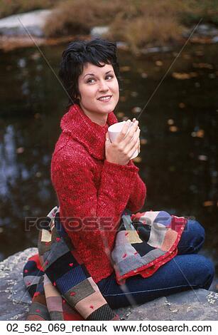 Stock Image - Woman, Happy, Autumn, Pensive, Drinking, Relaxing, Mug. Fotosearch