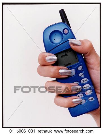 Stock Image - Woman, Inside, Detail, Hold, Holding, Mobile Phone, Cellphone. Fotosearch