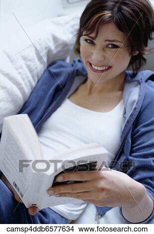 Woman, Reading, Relaxing, Inside, At Home View Large Photo Image Picture - Woman, Reading, Relaxing, Inside, At Home. Fotosearch