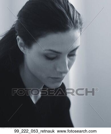 Stock Image - Woman, Sad, Depression, Thinking, Pensive, Stressed, Portrait. Fotosearch