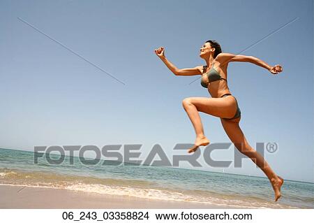 beach, beauty, bikini, dark, hair, nature, outside View Large Photo Image Picture - beach, beauty, bikini, dark, hair, nature, outside. Fotosearch