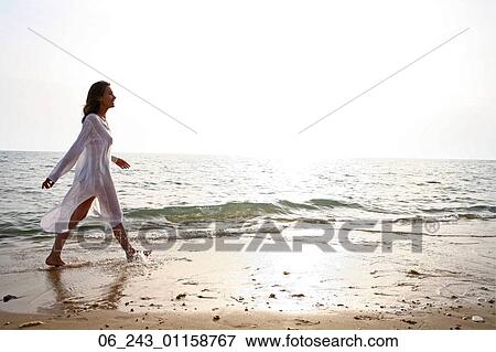 beach, kaftan, nature, outside, sea, season, vacation View Large Photo Image Stock Photo - beach, kaftan, nature, outside, sea, season, vacation. Fotosearch