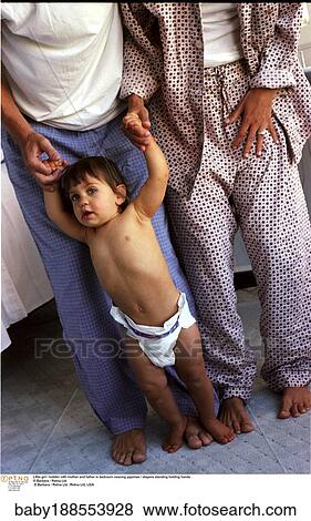Stock Photo - Bedroom, Family, Members, Father, Happy, Inside, Mother. Fotosearch