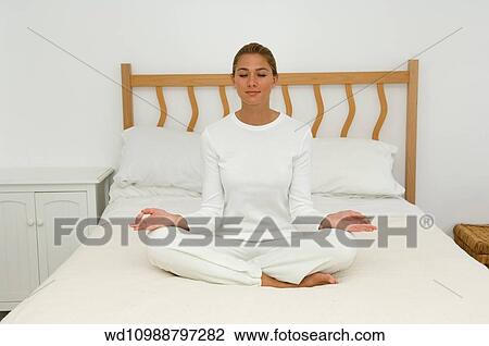 Stock Image - bedroom, home, yoga, 35, straight. Fotosearch