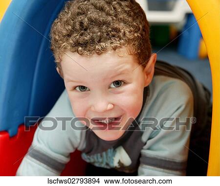 Boy, Playing, Eye, Contact, 3-6, Curly, Hair View Large Photo Image Picture - Boy, Playing, Eye, Contact, 3-6, Curly, Hair. Fotosearch