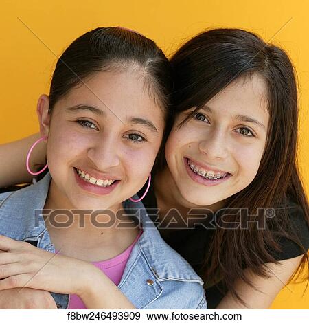Braces, Girls, Inside, Indoors, Studio, Denim View Large Photo Image Stock Photo - Braces, Girls, Inside, Indoors, Studio, Denim. Fotosearch