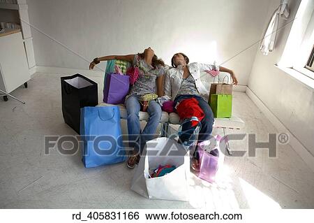 Stock Photograph - exhausted, day, acquiring, Color, Horizontal. Fotosearch