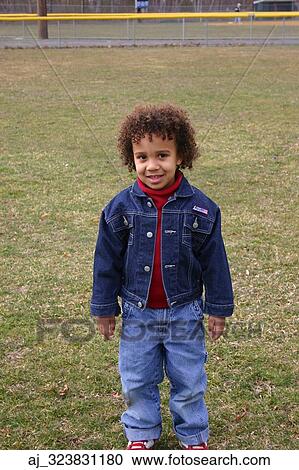 field, boy, denim, curly, color, grass, autumn View Large Photo Image Stock Image - field, boy, denim, curly, color, grass, autumn. Fotosearch
