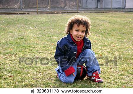 field, boy, denim, curly, color, grass, autumn View Large Photo Image Stock Photo - field, boy, denim, curly, color, grass, autumn. Fotosearch