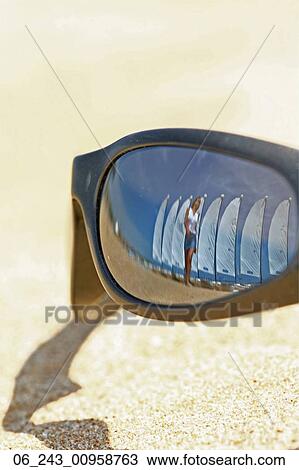 front, view, objects, sand, still, life, sunglasses View Large Photo Image Stock Image - front, view, objects, sand, still, life, sunglasses. Fotosearch