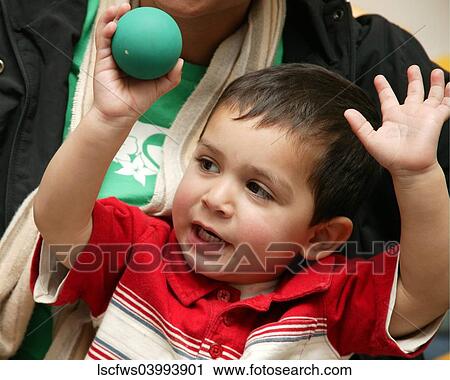 Stock Image - Gesturing, Boy, 2-5, Ball, Color, Toddler, Brunette. Fotosearch