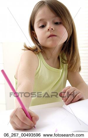 Stock Photograph - girl, pencil, paper, writing. Fotosearch