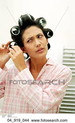 hair, rollers, Woman, Unhappy, Inside, Bathroom View Large Photo Image Picture - hair, rollers, Woman, Unhappy, Inside, Bathroom. Fotosearch
