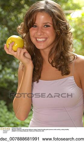 happy, brunette, park, summer, smile, smiling, eating, apple View Large Photo Image Stock Image - happy, brunette, park, summer, smile, smiling, eating, apple. Fotosearch