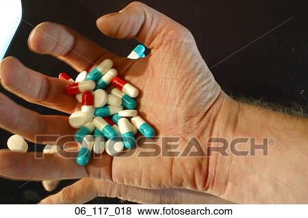 Stock Photo - health, hand, pills. Fotosearch
