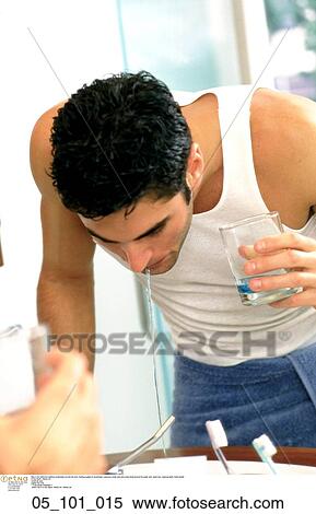 holding, galss, mouthwash, wearing View Large Photo Image Stock Photography - holding, galss, mouthwash, wearing. Fotosearch