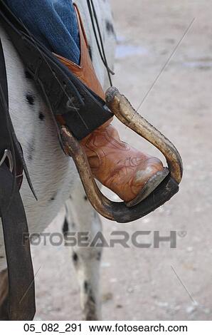 Stock Image - horse, cowboy, boot. Fotosearch