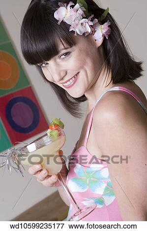 Stock Photo - orchids, hair, She, sitting. Fotosearch