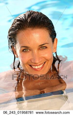 Stock Image - outside, season, summer, swimming, pool, wet, woman. Fotosearch