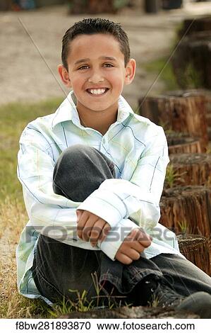 Outside, Sitting, Boy, Color, Latin, Vertical View Large Photo Image Stock Image - Outside, Sitting, Boy, Color, Latin, Vertical. Fotosearch