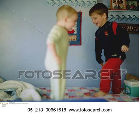 Playing, Inside, Pajamas, Happy, Child, Boy, Bedroom View Large Photo Image Stock Photo - Playing, Inside, Pajamas, Happy, Child, Boy, Bedroom. Fotosearch