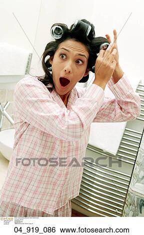 putting, hair, rollers, shocked View Large Photo Image Stock Photograph - putting, hair, rollers, shocked. Fotosearch