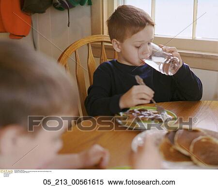 Spring, Kitchen, Inside, Eating, Drinking, Child, Boy View Large Photo Image Stock Photography - Spring, Kitchen, Inside, Eating, Drinking, Child, Boy. Fotosearch