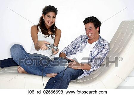 Technology, Smiling, Playing View Large Photo Image Stock Photo - Technology, Smiling, Playing. Fotosearch