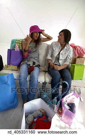 Stock Image - they, showed, off, thier, new, clothing, acquiring. Fotosearch
