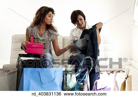 Stock Photograph - they, showed, off, thier, new, clothing, acquiring. Fotosearch