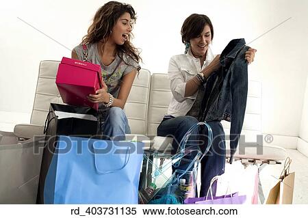 Stock Photography - they, showed, off, thier, new, clothing, acquiring. Fotosearch