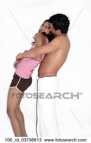 Stock Image - Together, Playful, Love, Intimate, Hugging, Hug, Happy. Fotosearch