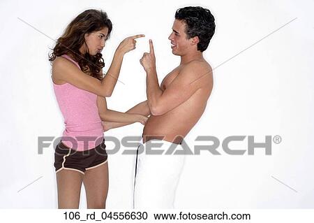 Topless, Shorts, Relationships, Pointing, Playful, Love, Indoors View Large Photo Image Stock Image - Topless, Shorts, Relationships, Pointing, Playful, Love, Indoors. Fotosearch
