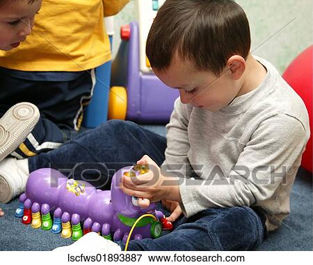 Toy, Playing, Boy, 3-6, Fun, child, Recess View Large Photo Image Stock Photo - Toy, Playing, Boy, 3-6, Fun, child, Recess. Fotosearch