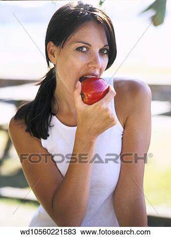 wearing, white, vest, top, eating View Large Photo Image Stock Image - wearing, white, vest, top, eating. Fotosearch