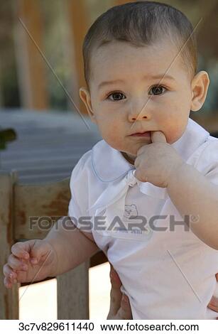 White, shirt, surprised, sunlight, outside, interested, Infant View Large Photo Image Stock Image - White, shirt, surprised, sunlight, outside, interested, Infant. Fotosearch