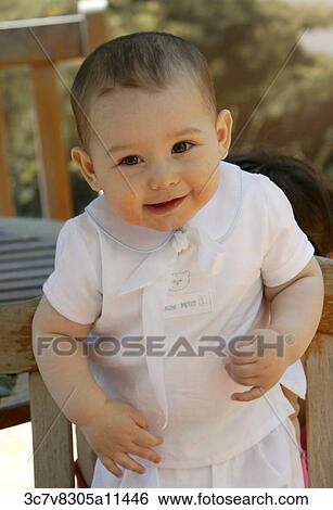 White, shirt, surprised, sunlight, outside, Infant, happy View Large Photo Image Stock Photograph - White, shirt, surprised, sunlight, outside, Infant, happy. Fotosearch