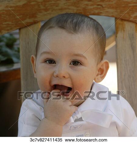 White, shirt, surprised, sunlight, outside, Infant, happy View Large Photo Image Stock Photography - White, shirt, surprised, sunlight, outside, Infant, happy. Fotosearch