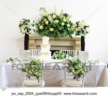 Stock Image - white, tiered, cake, decorated, flowers, posies. Fotosearch