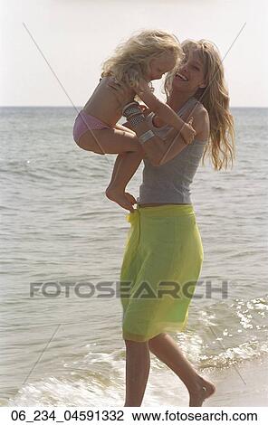 woman, child, beach, ocean, 30s View Large Photo Image Stock Image - woman, child, beach, ocean, 30s. Fotosearch