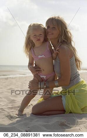 woman, child, beach, ocean, 30s View Large Photo Image Stock Image - woman, child, beach, ocean, 30s. Fotosearch