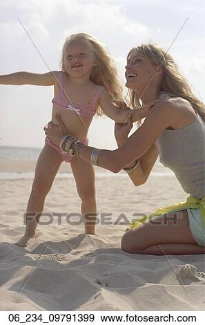woman, child, beach, ocean, 30s View Large Photo Image Stock Photo - woman, child, beach, ocean, 30s. Fotosearch